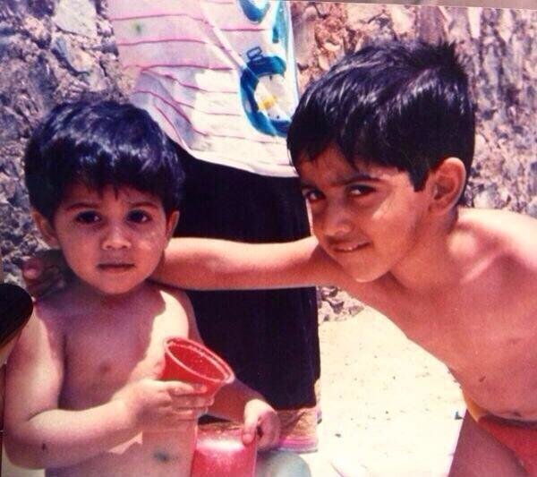 varun and his brother childhood picture