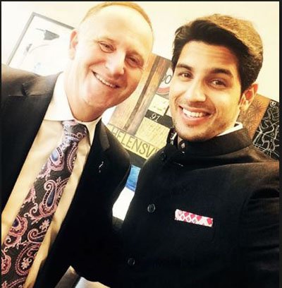 Sidharth Malhotra and the New Zealand Prime Minister in 2015.jpg