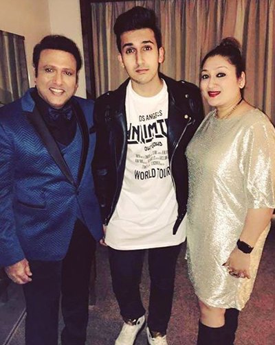 Govinda_s_Son_Yashvardhan_Might_Just_Sweep_You_Off_Your_Feet_beware_girls_posing_with_parents_.jpg
