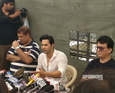 varun and david dhawan at a press meet