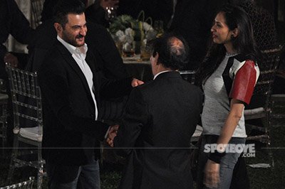 sanjay kapoor interacts with guests at randhir kapoors 70th birthday