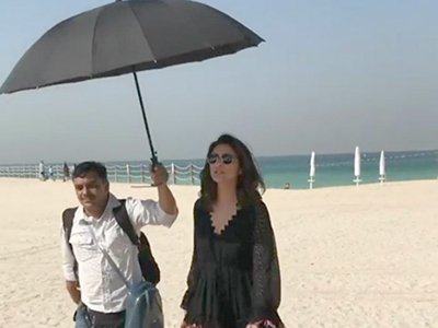 parineeti chopras spot holding the umbrella