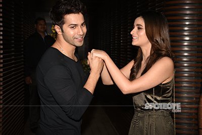 varun dhawan and alia bhatt in a romantic pose