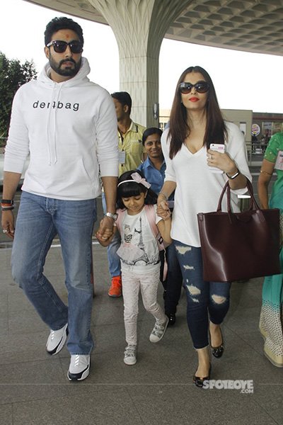 abhishek bachchan with wife aishwarya rai and daughter at mumbai airport enroute dubai