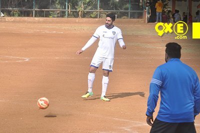 abhishek bachchan spends the day playing football