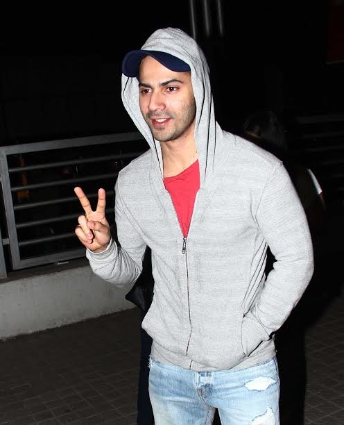 varun snapped outside a theatre in juhu