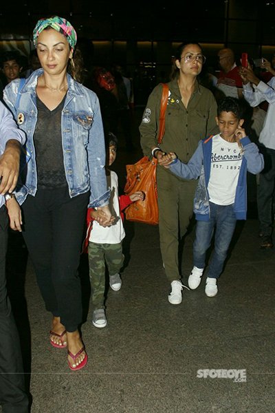 amrita arora spotted at the airport with her kids