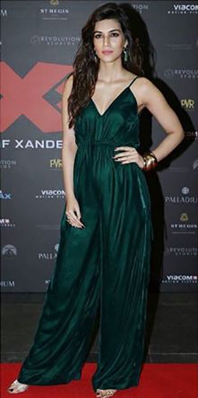 kriti sanon in a green jumper