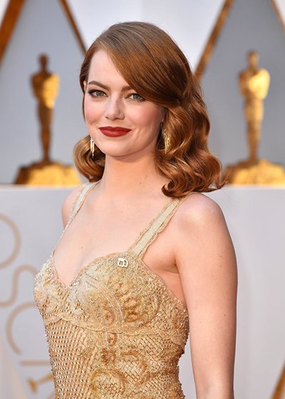 Emma Stone Stuns in Cheerful Yellow Versace Atelier Gown in London