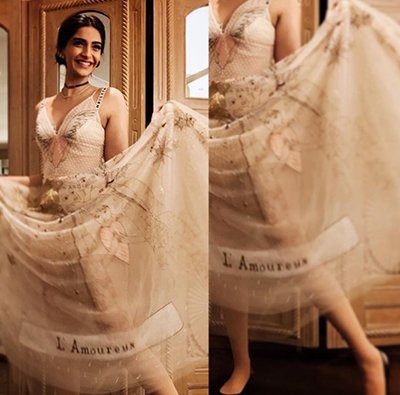 sonam kapoor posing in her dior dress