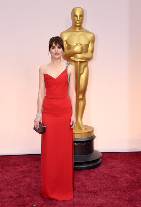 dakota johnson in red column gown by saint laurent