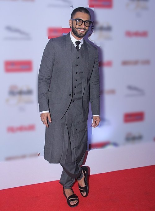 ranveer singh in three piece suit with a skirt and trousers