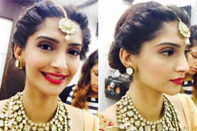 sonam kapoor s twisting sides hair do with maang tikka