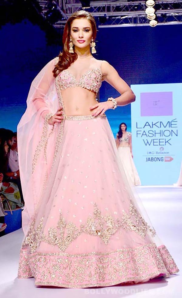 amy jackson in a pastel pink lehenga