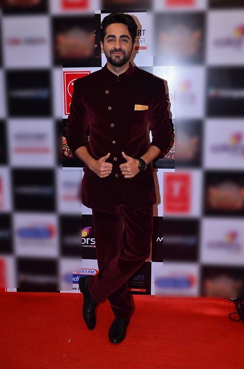 ayushmann khurrana in an velvet suit at an musical event