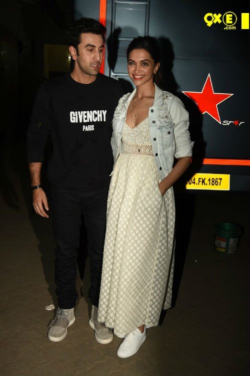 ranbir in all black and deepika in a maxi dress with jacket