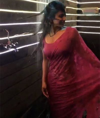 mouni roy in saree under the shower