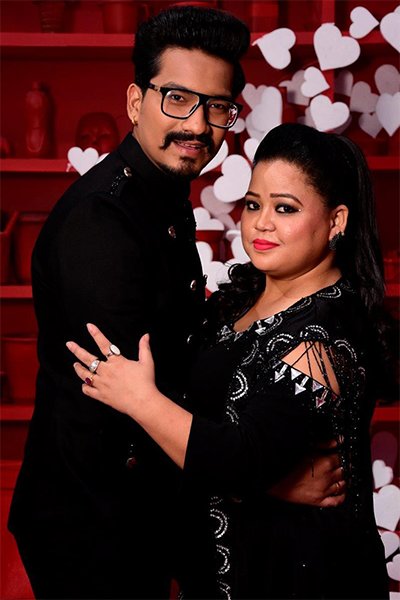 bharti singh and harsh posing