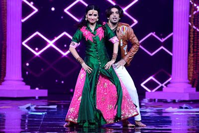 sanaya irani and mohit sehgal performance to the title track of badrinath ki dulhania during  the grand premiere of nach baliye 8