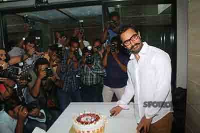 aamir khan poses for the media on his birthday