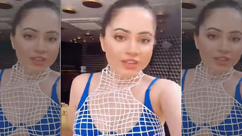Urfi Javed Grabs Eyeballs Yet Again As She Dons Electric Blue Bikini Top, Teams It With White Net; Actress Is Seen Dancing To Gayle’s Song