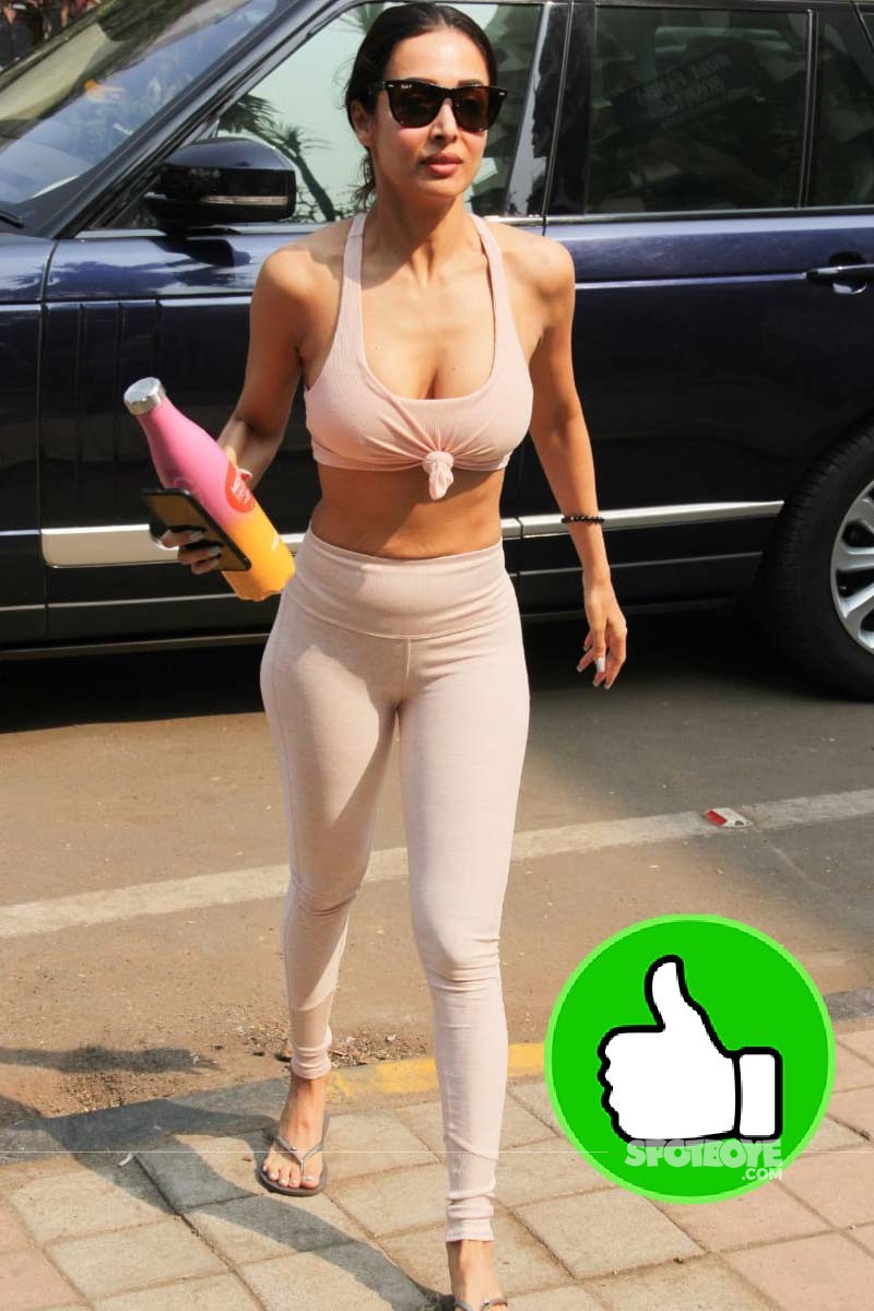 Malaika Arora Looks Uber Cool In Yoga Pants, Crop Top; Netizen