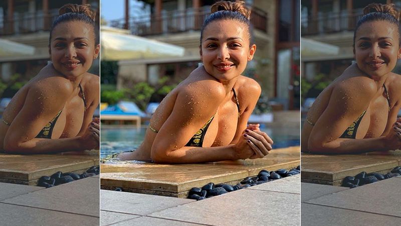 Malaika Arora Shares A Piping Hot Bikini Picture Posing In The Pool; It's A Happy Sunday, Alright!