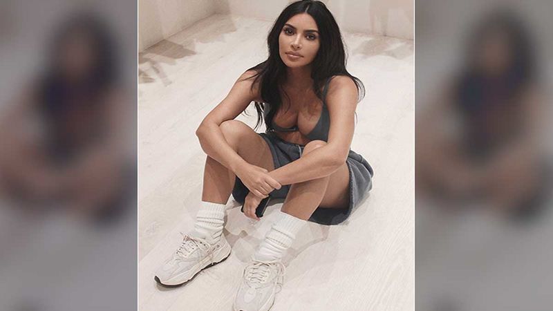 Kim Kardashian Is A Fan Of OPEN BUST Bodysuits And Tops And These Pictures Are Proof