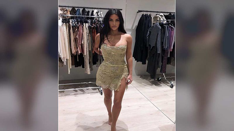 Kim Kardashian Gives Fans A Sneak-Peek Into Her Closet; Strikes A Sexy Pose In The ‘Dress Fittings’ Picture