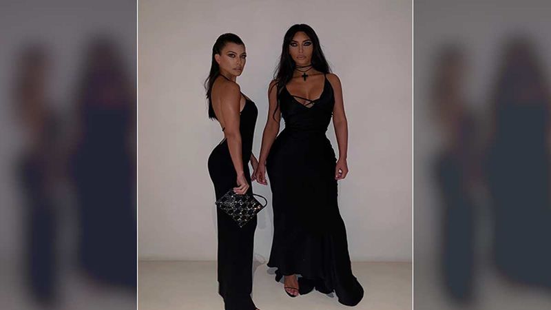 Kim Kardashian-  Kourtney Kardashian Make Heads Turn With Their Bold Outfit Choices At The Dior Men's Show