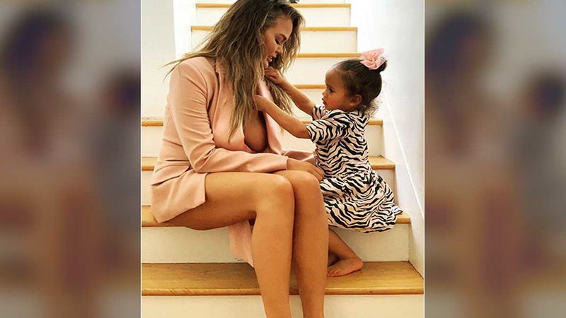 Chrissy Teigen Lashes Out At Trolls As They Insist On She Covering Her Breasts In Front Of Daughter Luna