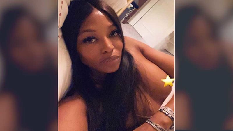 Naomi Campbell Covers Her Nip With A Star Emoji; Shares A Sexy Boob Pop-Out Selfie From Bed - HOT