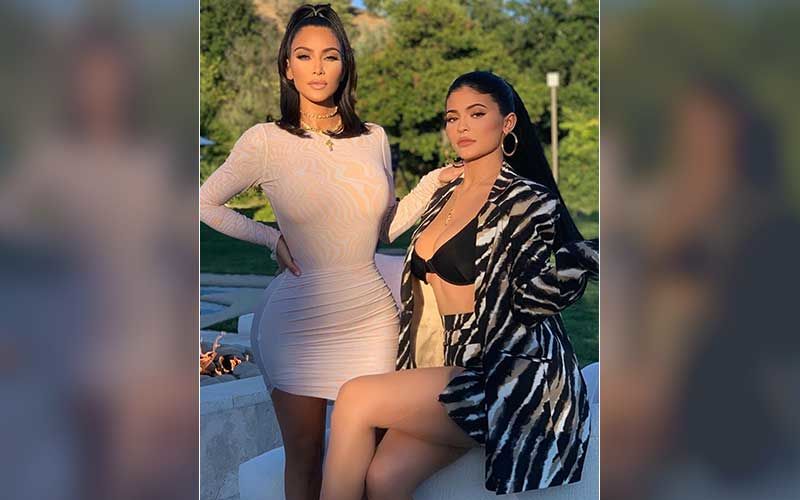 Kylie Jenner And Kim Kardashian Get Mocked For Wearing Skinny Pants In TB Pic; Fan Says, ‘Looks Like They Got Diapers On’