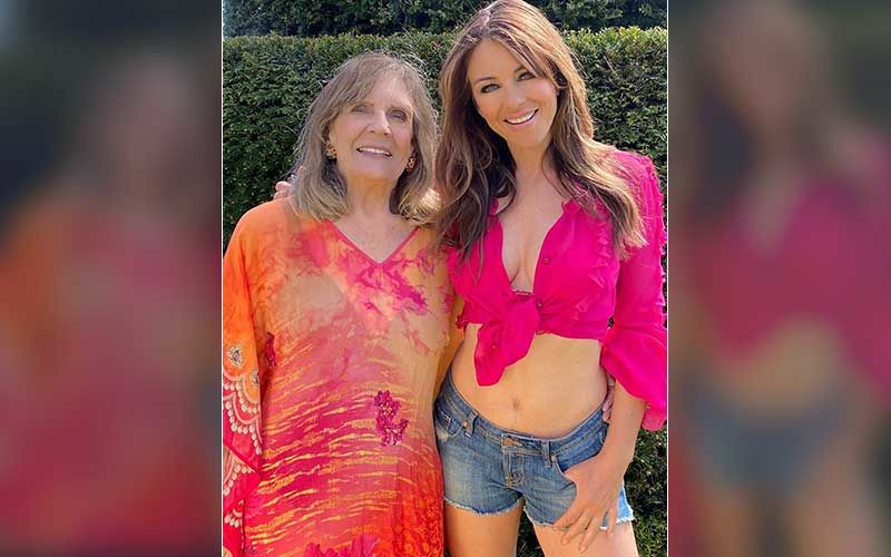 Elizabeth Hurley Flaunts Her Toned Abs In A Hot Pink Crop Top And Shorts; Shares Pic Celebrating Mom’s 80th Birthday