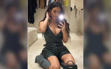 Kim Kardashian Enjoys A Night Swim In A Tiny Bikini; Flaunts Her Curvaceous Body While Posing Like A Bombshell-PICS INSIDE