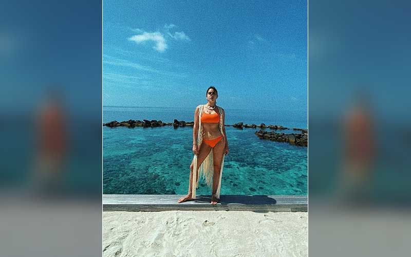 Sara Ali Khan Drops A Sexy Pic Posing In An Orange Bikini; Gives Fans Their ‘Daily Dose Of Vitamin C’