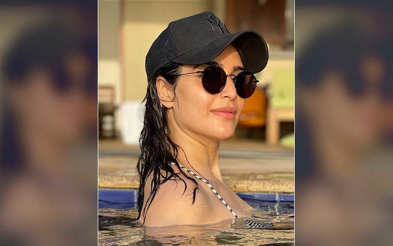 Karishma Tanna Exudes Summer Vibes As She Takes A Dip In The Pool On A Sunny Day; Calls Herself ‘Pool Holic’
