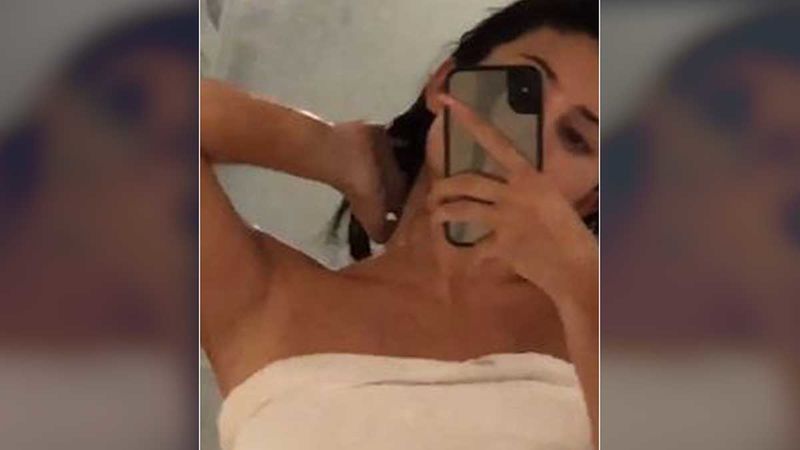 Kylie Jenner Is Turning Up The Heat With Her After Shower Video In A Pink Bath Towel