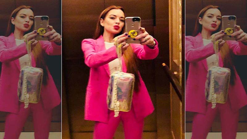 Newly Single Lindsay Lohan Makes Eyes Pop In A Slinky Pink Dress At The Playboy Pop-Up Party