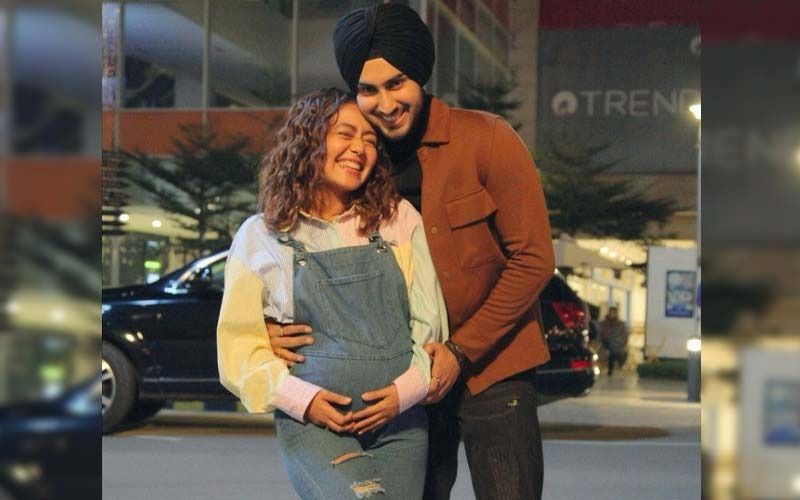 Neha Kakkar Announces Her Pregnancy As She Cradles Her Baby Bump In An Adorable Snap With Hubby Rohanpreet Singh