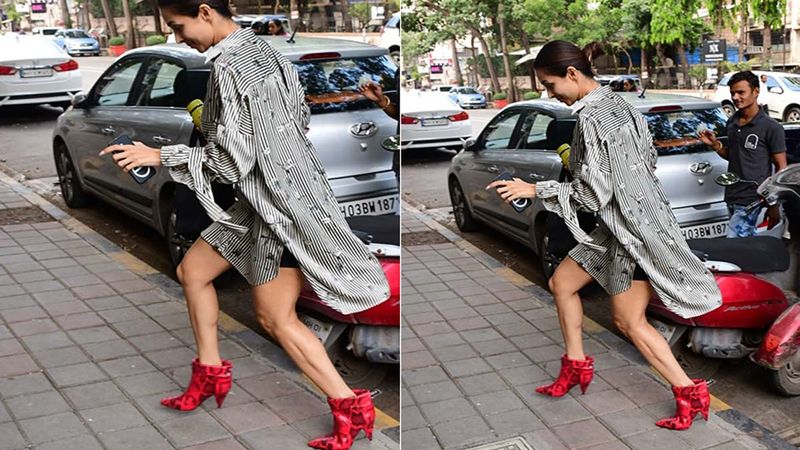 Not Malaika Arora But Her Red Boots Is What Draws Our Attraction Instantly