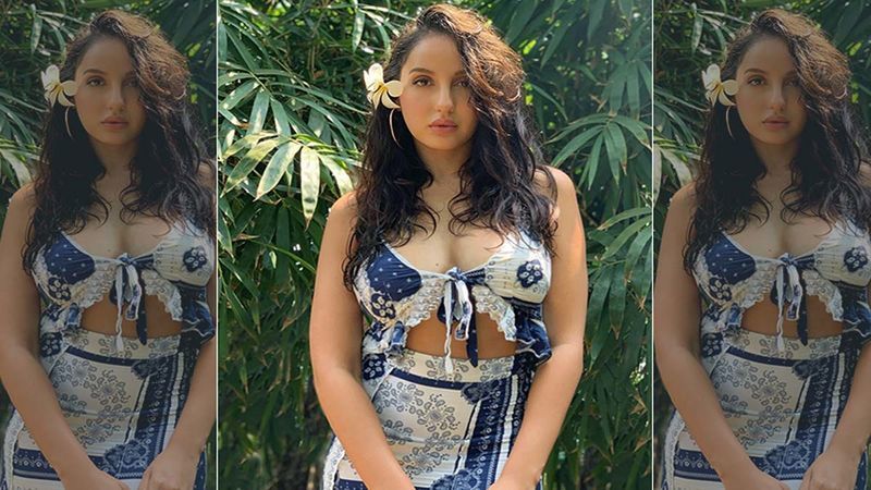 Nora Fatehi Shows Off Her Cleavage In A Sexy Golden Bodycon Gown In The  FIRST LOOK