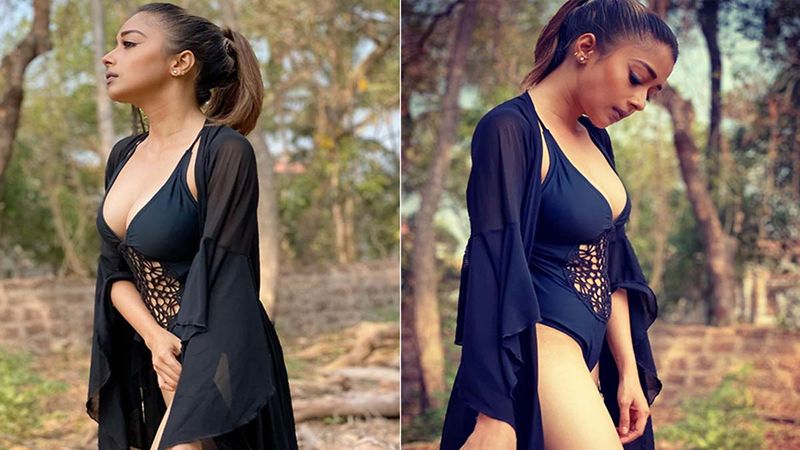Tinaa Dattaa Dons A Sexy Black Monokini, Looks Sizzling Hot As She Looks Lost In Her Thoughts