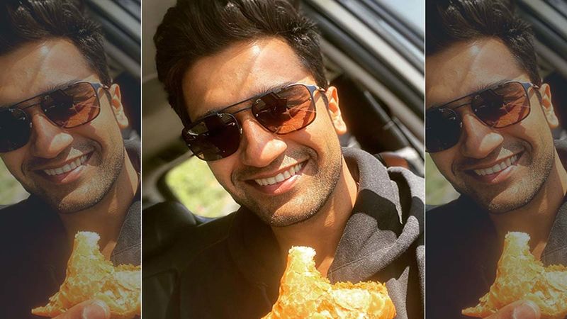 Vicky Kaushal Cheats On His Diet As He Relishes Samosa Brought By His Female Fan At The Airport; Pens A Message For Her Parents
