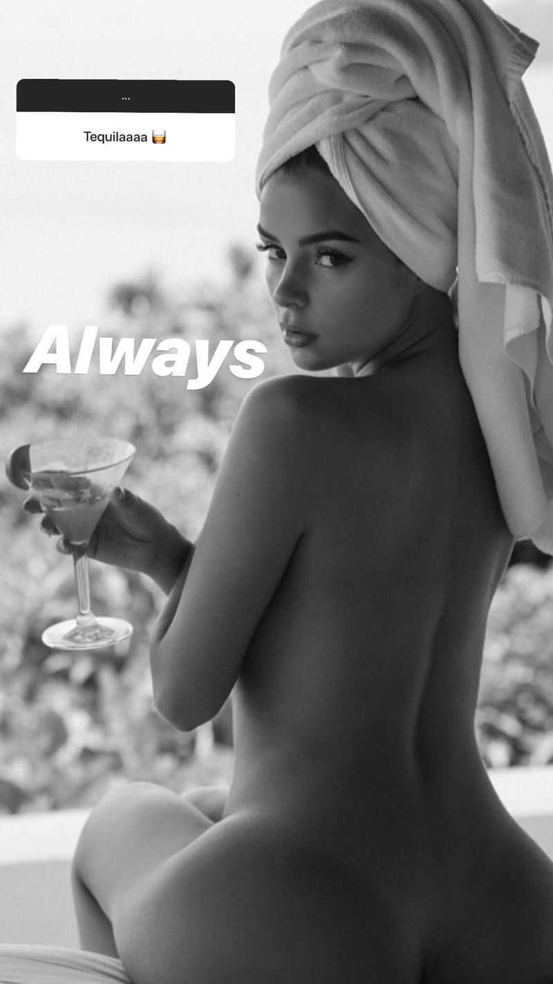 Demi Rose Covers Her Naked Body With A Book & Blanket In Sultry Snaps