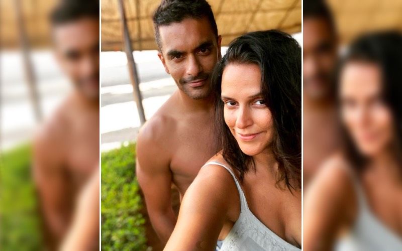 Preggers Neha Dhupia Shows Us ‘The Balancing Act Between Being Pregnant And Stilettos’ In A Cute BTS Photoshoot With Husband Angad Bedi- Watch