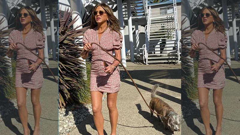 Jennifer Aniston Brings Her Furry Best Friend Clyde To Work, But It’s Her Perfectly-Toned Legs That Caught Our Eyes