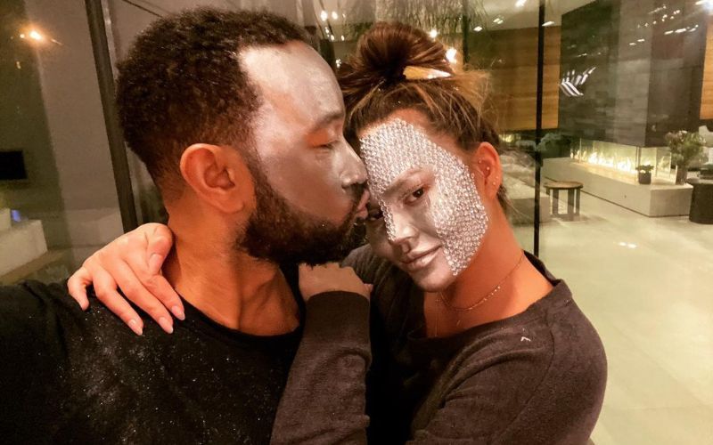John Legend Has A Very Naughty Reaction To Wife Chrissy Teigen's 'F*** It' Pic Cuddling Their Pet In A Bralette; Leaves The Latter Speechless