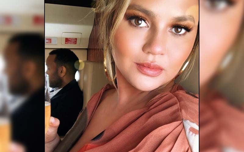 Chrissy Teigen Gets Trolled For Posting A Topless Picture Of Herself With Son Miles; Model Claps Back At Her Haters