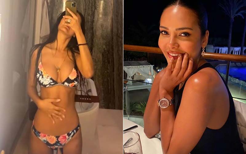 Esha Gupta Turns Up The Heat As She Sizzles In A Floral Bikini And Flaunts Her Curvaceous Figure -WATCH VIDEO
